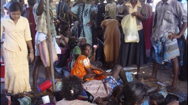 Sri Lankan ethnic Tamils take shelter at a makeshift hospital in Mullivaaykaal, Sri Lanka. 