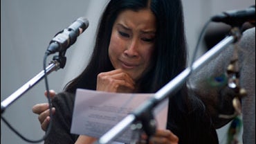 Lisa Ling breaks down while addressing attendees of a vigil for her sister Laura Ling and Euna Lee, the two American journalists who are scheduled to go on trial in Pyongyang, North Korea, Thursday, at the Wokcano Cafe in Santa Monica, Calif., on Wednesda 