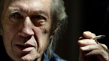 FILE - In this Wednesday, March 10, 2004 file photo, actor David Carradine poses for a photo at his home in the Tarzana section of Los Angeles. (AP Photo/Ric Francis) 