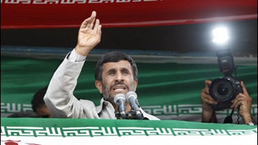 Iranian President Mahmoud Ahmadinejad addresses tens of thousands of supporters at a rally in Vali Asr square in Tehran, Iran Sunday, June 14, 2009. 