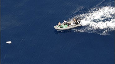 French army shows soldiers approaching a piece of debris believed to be part of Air France flight 447 