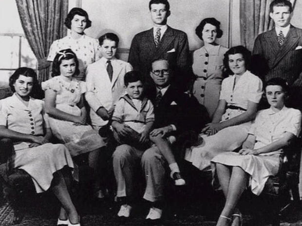 The Kennedys pose for a family portrait in 1930. From left: Eunice, Jean, Rosemary, Robert, Edward, Joseph Sr., John, Rose, Pat, Kathleen and Joe Jr. 