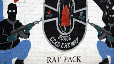 An Ulster Volunteer Force (UVF) mural in North Belfast, seen in this Oct. 31, 2005 file photo. The paramilitary group has decommissioned its weapons, it was announced Friday. 
