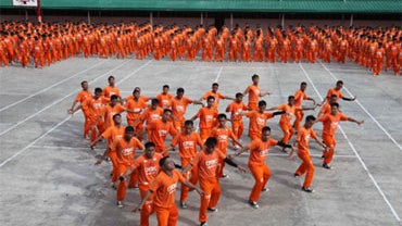 Inmates at the island province of Cebu in central Philippines dance to the late Michael Jackson's "Thriller" to pay tribute to the music icon Saturday June 27, 2009. 