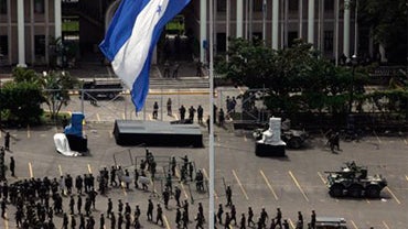 Soldiers gather at Libertad square in front of the presidential residency in Tegucigalpa, Monday, June 29. 2009. 