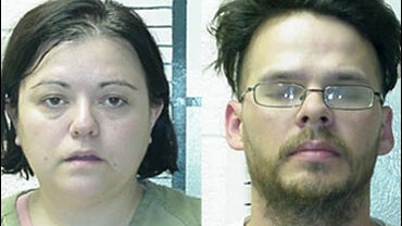 This undated photo released by the Hill County Sheriff shows Denise Wolf, left, and Abel Wolf. The Oklahoma couple has been arrested for investigation of burying a young girl then digging up her remains and moving the body from state to state for more tha 