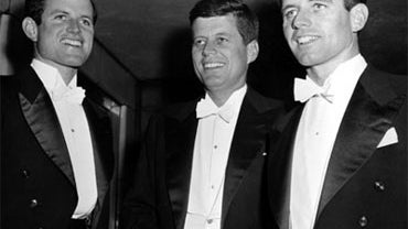 Edward Kennedy, left, then a student at the University of Virginia, attends the 1958 Gridiron Club dinner in Washington, D.C., with brothers Sen. John F. Kennedy, and Robert F. Kennedy, then chief counsel to the Senate Rackets Committee. 