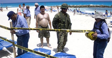 Alleged Cancun Sand Thieves Raided - CBS News