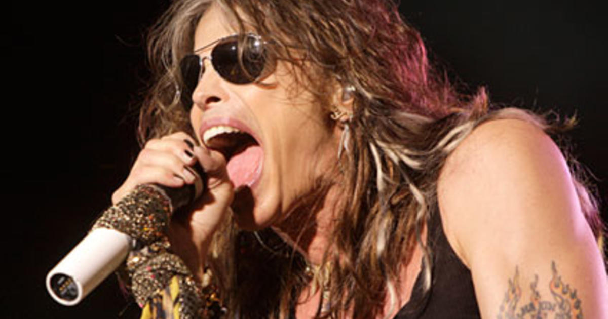 Aerosmith lead singer Steven Tyler sings 'God Bless America' during the  seventh inning stretch of the Red Sox home opener against the Detroit  Tigers at Fenway Park in Boston, Massachusetts on April