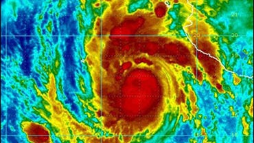In this satellite image released by NOAA Monday, Aug. 31, 2009, Hurricane Jimena is seen off the coast of Mexico. Jimena, a dangerous Category 4 storm, could rake southern Baja California by Tuesday evening, forecasters said. The U.S. hurricane center iss 