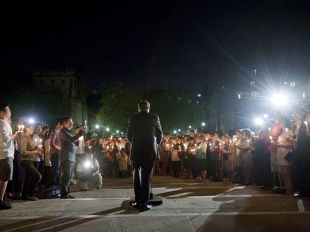 Yale University President Richard C. Levin speaks to members of the university at a candlelight vigil for slain graduate student Annie Le. 