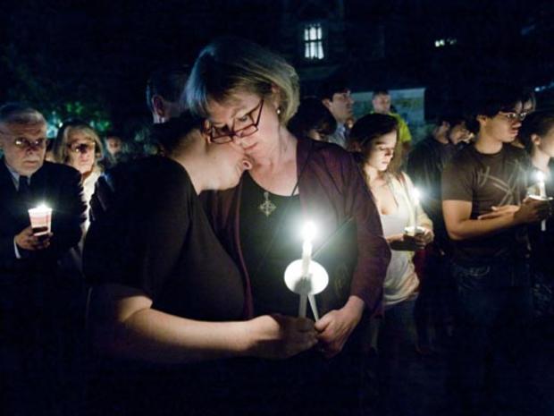 Yale University Chaplain Sharon Kugler, right, consoles student Natalie Powers, Annie Le's roommate. 
