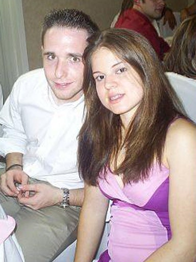 SLIDESHOW - Personal photo of Raymond Clark III and fiancee Jennifer Hromadka. Clark, a Yale University animal research technician, has been described as a person of interest, not a suspect, in Yale grad student Annie Le's death. 