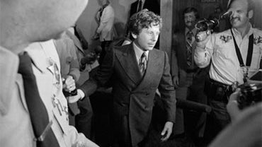 A 1977 file photo of director Roman Polanski leaving court in Santa Monica, Calif. 