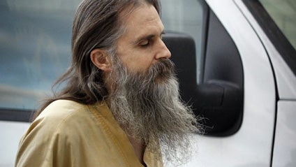 Brian David Mitchell arrives at the Salt Lake City federal courthouse for a hearing Thursday, Oct. 1 2009, in Salt Lake City. Elizabeth Smart is testifying in Mitchell's competency hearing for the first time since her kidnapping in 2002. (AP Photo/Colin B 