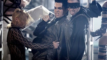 Adam Lambert performing at the AMAs 