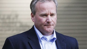 Michael D. Barrett departs the Metropolitan Correctional Center in Chicago Oct. 5, 2009. 