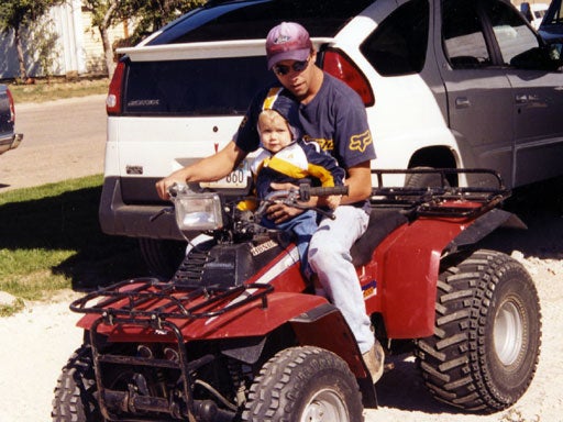 Mike Golub introduces his son to the joys of riding. 