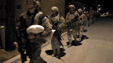 The 467th Medical Detachment based out of Madison, Wis., marches to the chapel at Fort Hood, Texas, Friday, Dec. 4, 2009, as they prepare to head to the airport for their deployment to Afghanistan. The 467th Medical Detachment lost several soldiers during 