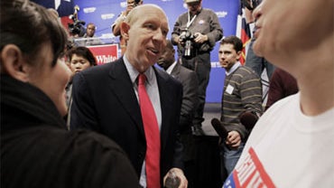 Houston Mayor Bill White, center, shakes hands with supporters after a campaign event announcing his decision to run to Texas Governor Friday, Dec. 4, 2009 in Houston. 