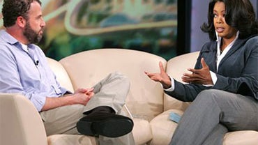  This file photo originally provided by Harpo Productions shows Oprah Winfrey, right, on Jan. 26, 2006, during her live television interview with James Frey, author of "A Million Little Pieces," in Chicago. (AP Photo/Harpo Productions, George Burns) 