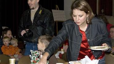Susan Powell, right, at a church function with her husband Josh Powell, left, Dec. 5, 2009 
