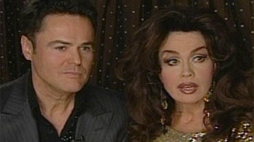 Donny and Marie Osmond perform Christmas songs in their Las Vegas act. 