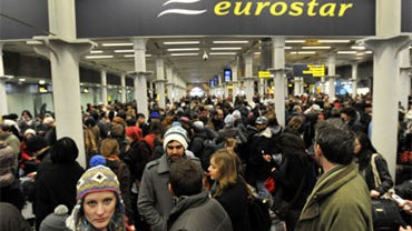 Passengers wait at St Pancras Station in London after delays to the Eurostar train services, Saturday Dec. 19, 2009. The Eurostar train service between Britain and France was suspended Saturday morning after more than 2,000 passengers were stranded for ho 