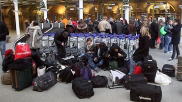 Passengers are told that all Eurostar trains are cancelled, at London's St. Pancras station, Sunday, December 20, 2009. 