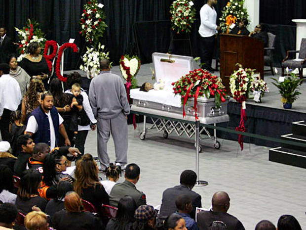 SLIDESHOW - Chris 'Slim' Henry" before a memorial service for Cincinnati Bengals wide receiver Chris Henry in Westwego, La., Tuesday, Dec. 22, 2009. Reiss grew up with Henry in nearby Belle Chasse and visited with him two weeks ago. Henry died Thursday, D 