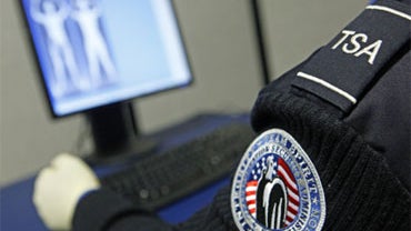 A Transportation Security Administration officer views a full-body scan during a demonstration of passenger screening technology, Wednesday, Dec. 30, 2009, at the TSA Systems Integration Facility in Arlington, Va. 