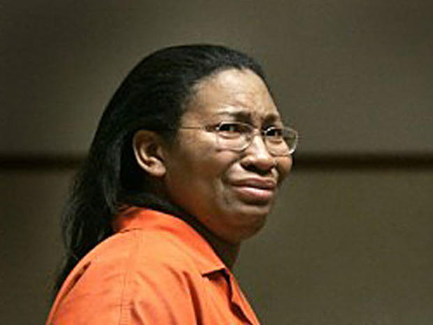 Lorrie Mae Thomas, the adoptive mother of a 9-year-old quadriplegic girl whose body was found in a Michigan storage unit cries during a court hearing in Flint, Mich., Friday, April 24, 2009. Thomas was arraigned in 68th District Court in Flint on six char 