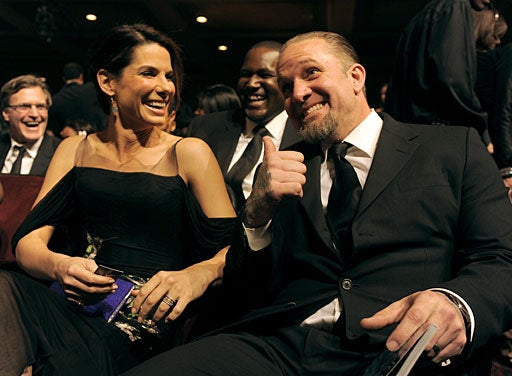 Jesse James (L) and his wife actress Sandra Bullock 