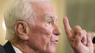 Former astronaut Gene Cernan, the last astronaut on the moon, testifiy at a hearing on NASA's proposed budget and the future of the manned space flight program on Capitol Hill in Washington, Wednesday, May 12, 2010. (AP Photo/Cliff Owen) 