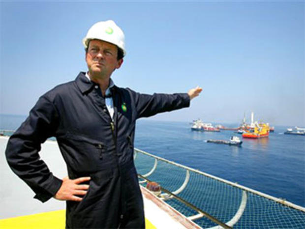 In this May 28, 2010 photo, BP CEO Tony Hayward stands aboard the Discover Enterprise drill ship during recovery operations in the Gulf of Mexico, south of Venice, La. (AP Photo/Sean Gardner, Pool) 