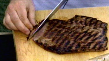 "Chef on a Shoestring" Mikey Price prepares Lime, Honey and Chili-Marinated Flank Steak with Corn Salad, on "The Early Show on Saturday Morning," June 19, 2010.  