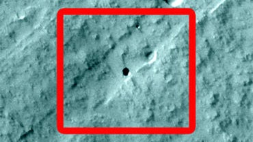 Sixteen seventh-grade students at Evergreen Middle School in Cottonwood, Calif., found the Martian pit feature at the center of the superimposed red square in this image while participating in a program that enables students to use the camera on NASA's Ma 