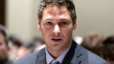 In this Feb. 1, 2010 file photo, State Sen. Charlie Janssen of Fremont introduces, (LB1001), a bill that would repeal the law that allows students whose parents brought them to the United States illegally to be eligible for in-state tuition at state colle 