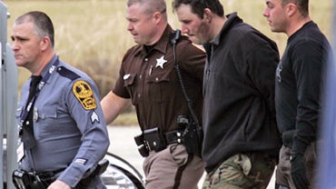 Christopher Speight being escorted by Appomattox State police Jan. 20 