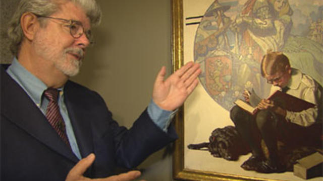 George Lucas with a 1923 Norman Rockwell painting, "Boy Reading Adventure Story," from his collection, currently on display at the Smithsonian American Art Museum in Washington, D.C. 