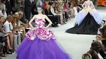 A model presents a creation by British fashion designer John Galliano, as part of the Christian Dior Fall-Winter 2010-2011 Haute Couture collection, in Paris, Monday July 5, 2010.(AP Photo/Remy de la Mauviniere) 