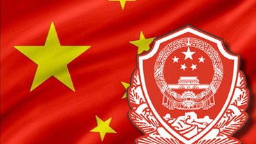 Chinese police emblem on Chinese flag  