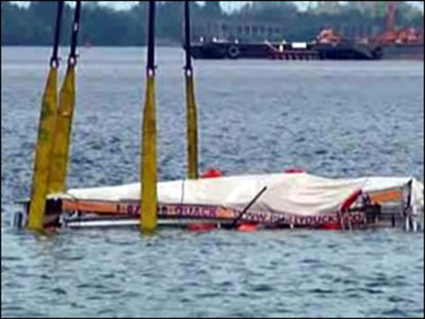 The sunken duck boat is retrieved from the bottom of the Delaware River, Philadelphia, July 9, 2010. 