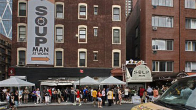 About 100 people stand in line for the reopening of the Original SoupMan gourmet takeout that inspired the Soup Nazi character on "Seinfeld," New York, Tuesday, July 20, 2010. (AP Photo/Bebeto Matthews) 