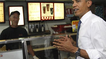 President Barack Obama places his order for submarine sandwich with Carl Padavano, before his meeting with small business owners, Wednesday, July 28, 2010, at the Tastee Sub Shop in Edison, N.J. 