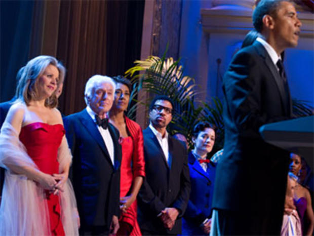 Musician Renee Fleming, actor Dick Van Dyke, anchor Robin Roberts and singer Lionel Richie listen as President Barack Obama speaks during the taping of "America Celebrates July 4th at Ford's Theatre," a gala honoring South African Archbishop Desmond Tutu  