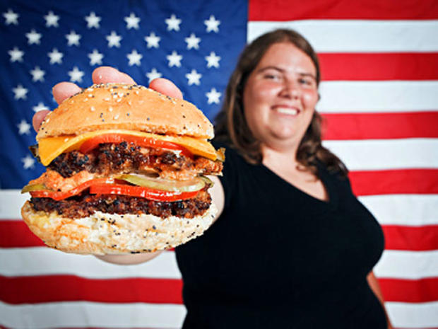 american flag, america, woman, happy, hamburger, fat, eat, eating, generic, stock 