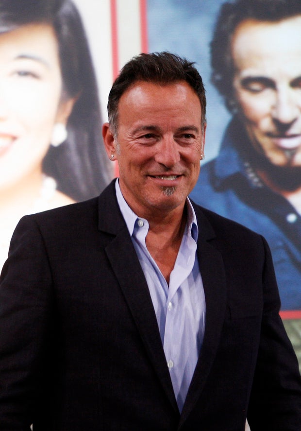r Bruce Springsteen stands on stage after being honored at the Ellis Island Family Heritage Awards in New York. (AP Photo/Jason DeCrow, file)