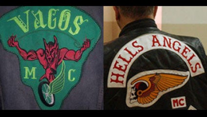 Logos for Vagos (l) and Hells Angels (r) motorcycle gangs 