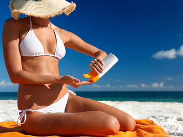 woman, tanning, sun, sunblock, sun block, sunscreen, sun screen, bikini, pretty, beach, tan, generic, stock 